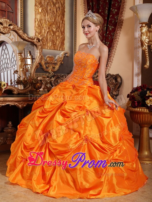 Pick-up and Beading Quinceanera Dress in Orange Strapless